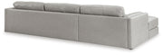 Ashley Furniture Amiata sectional with chaise, showing plush fabric upholstery and modern design from the back view.
