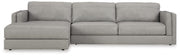 Ashley Furniture Amiata sectional with chaise, showing plush upholstered sofa with chaise lounge, in a modern living room setting.