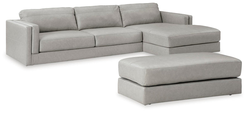 Ashley Furniture Amiata upholstery package featuring a stylish living room set with sofa and matching armchair.