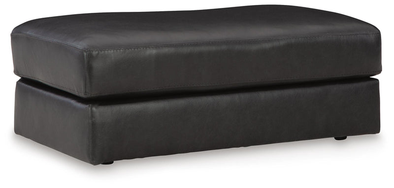 Ashley Furniture Amiata upholstery package featuring a modern living room set with sofa and loveseat in neutral fabric.