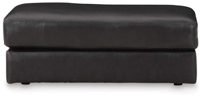 Ashley Furniture Amiata upholstery living room set with plush sofa and armchair, shown from a front head-on view.