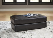 Ashley Furniture Amiata upholstery package featuring a stylish living room set with plush sofas and coordinating chairs.