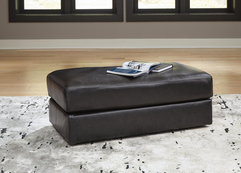 Ashley Furniture Amiata upholstery package featuring a stylish living room set with plush sofas and coordinating chairs.