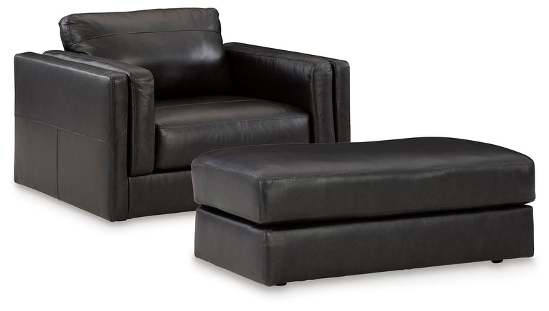 Ashley Furniture Amiata upholstery package featuring a stylish living room set with sofa, loveseat, and armchair in a modern design.