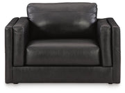 Ashley Furniture Amiata upholstery package showing a stylish living room set with plush sofas and coordinating cushions.