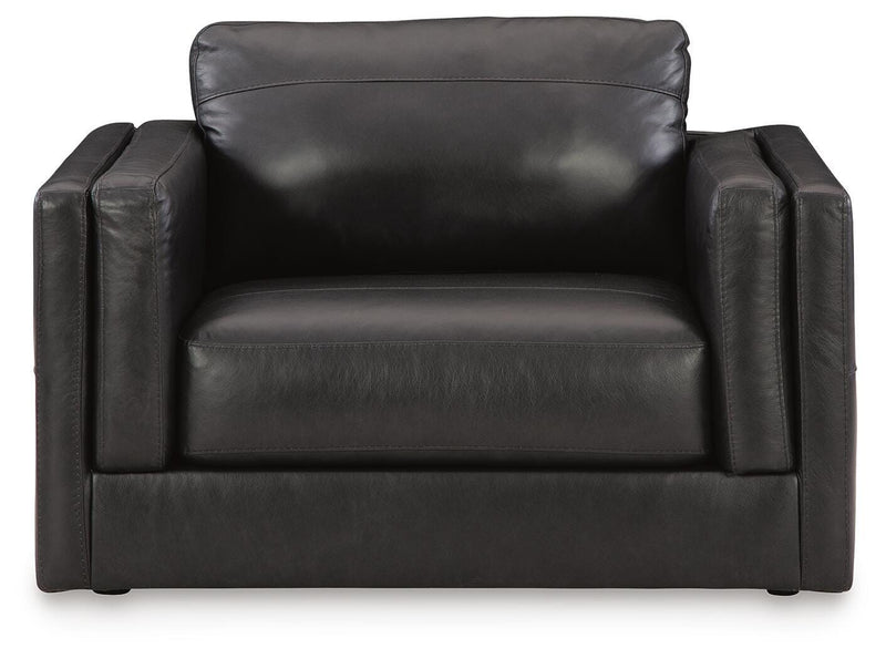 Ashley Furniture Amiata upholstery package showing a stylish living room set with plush sofas and coordinating cushions.