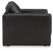 Ashley Furniture Amiata upholstery package for living room set, featuring plush sofa and loveseat with neutral fabric.