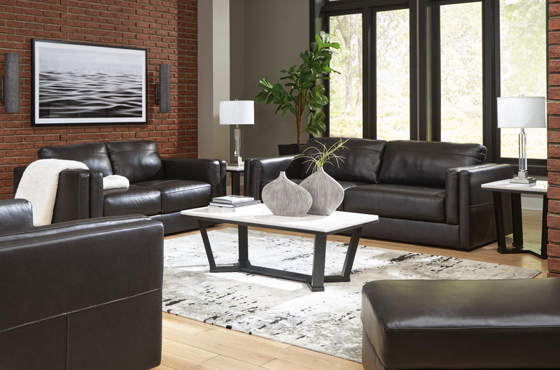 Ashley Furniture Amiata upholstery package featuring a modern living room set with sofa, loveseat, and matching armchair.