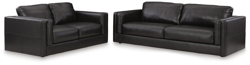 Ashley Furniture Amiata upholstery package featuring a stylish living room set with sofa, loveseat, and armchair in a modern fabric.