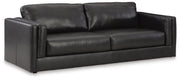Ashley Furniture Amiata upholstery package featuring a stylish living room set with sofa and armchair, shown from an angled view.