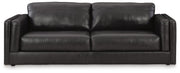 Ashley Furniture Amiata upholstery package featuring a modern living room set with plush fabric seating and coordinated coffee table.