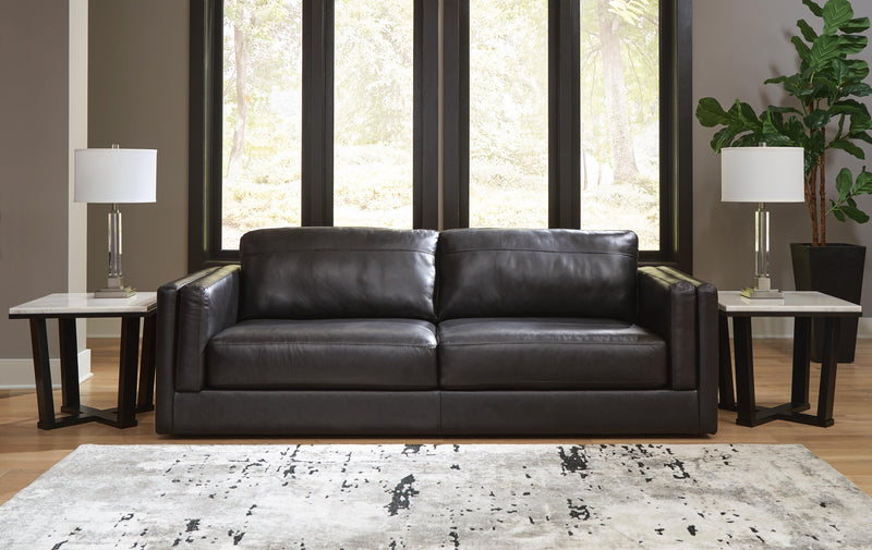 Ashley Furniture Amiata upholstery package for living room set, featuring plush fabric, cushions, and coordinated seating arrangement.