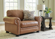 Ashley Furniture Carianna oversized chair with plush fabric and wide armrests, ideal for comfortable lounging in living rooms.
