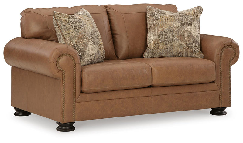 Ashley Furniture Carianna loveseat with plush fabric, angled view showing comfortable seating and stylish design.
