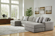 Ashley Furniture Avaliyah double chaise sectional with plush cushions and modern design, shown in a cozy living room setting.