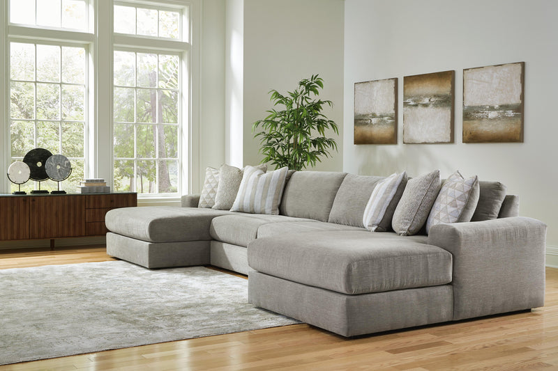 Ashley Furniture Avaliyah double chaise sectional with plush cushions and modern design, shown in a cozy living room setting.