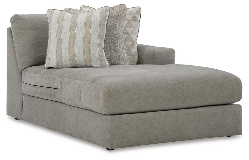Ashley Furniture Avaliyah sectional with chaise featuring plush fabric upholstery and modern design, shown from an angled view.