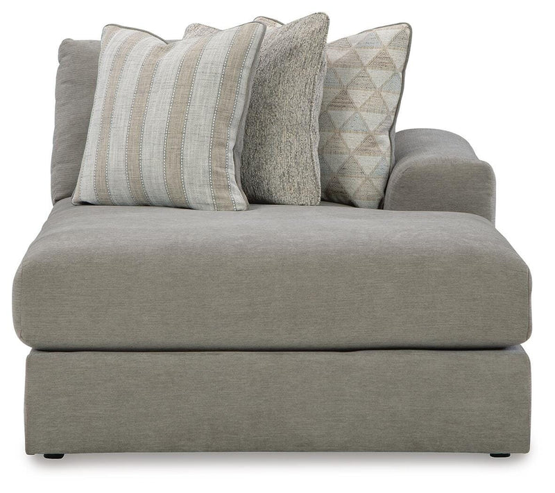 Ashley Furniture Avaliyah sectional with chaise, showing a contemporary fabric sofa with plush cushions and a spacious chaise lounge.