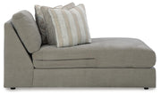 Ashley Furniture Avaliyah sectional with chaise showing plush fabric, modern design, and comfortable seating in a stylish living room setting.