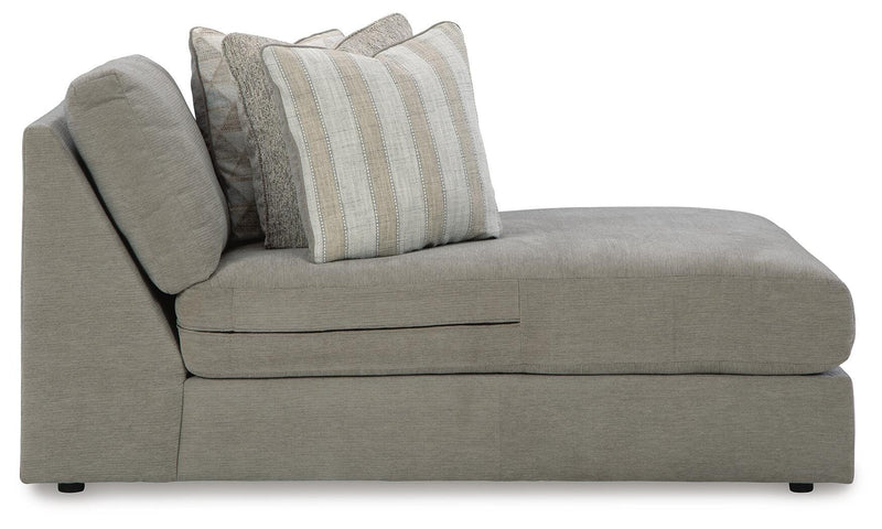 Ashley Furniture Avaliyah sectional with chaise showing plush fabric, modern design, and comfortable seating in a stylish living room setting.