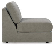 Ashley Furniture Avaliyah sectional with chaise, featuring plush cushions and modern design, shown in a cozy living room setting.