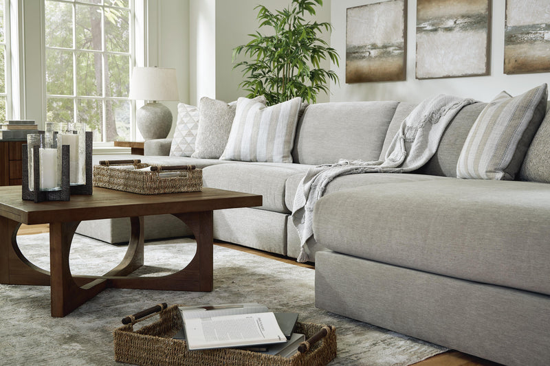 Ashley Furniture Avaliyah double chaise sectional with plush cushions and modern design, shown in a cozy living room setting.