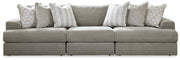 Ashley Furniture Avaliyah sectional sofa with plush cushions and modern design in a neutral fabric, shown in a stylish living room setting.