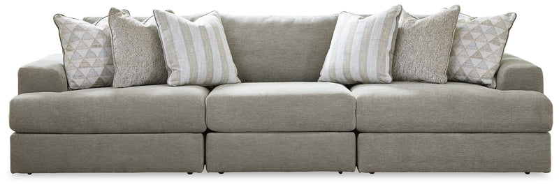 Ashley Furniture Avaliyah sectional sofa with plush cushions and modern design in a neutral fabric, shown in a stylish living room setting.
