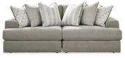 Ashley Furniture Avaliyah sectional loveseat with plush fabric and modern design, shown in a stylish living room setting.