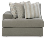 Ashley Furniture Avaliyah sectional with chaise, showcasing plush fabric, modern design, and comfortable seating in a stylish living room setting.
