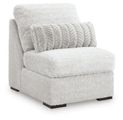 Ashley Furniture cuddle plush sectional with chaise, showing soft fabric upholstery and spacious seating arrangement.