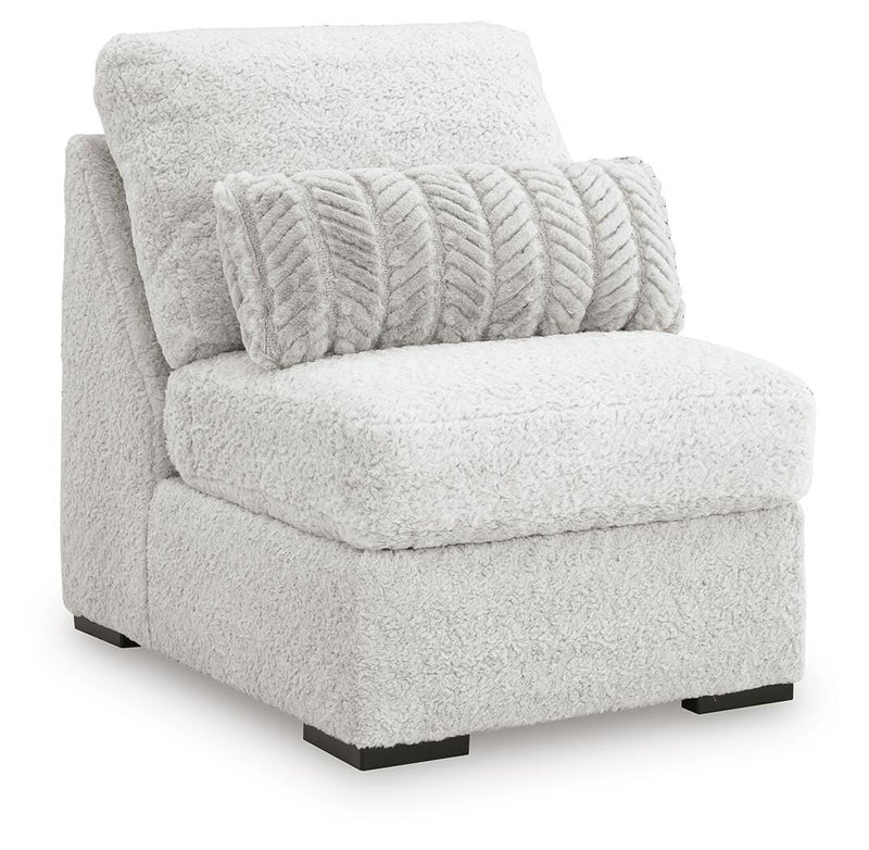 Ashley Furniture cuddle plush sectional with chaise, showing soft fabric upholstery and spacious seating arrangement.