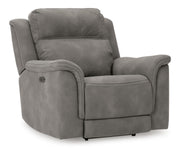 Ashley Furniture Next-Gen DuraPella living room set with sofa and armchair, shown from an angled view in a modern living space.