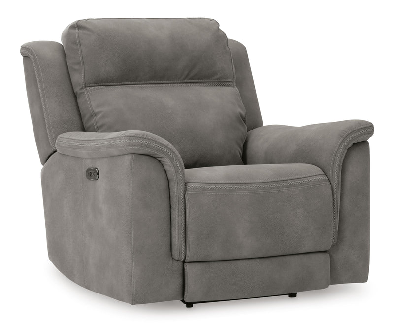 Ashley Furniture Next-Gen DuraPella living room set with sofa and armchair, shown from an angled view in a modern living space.