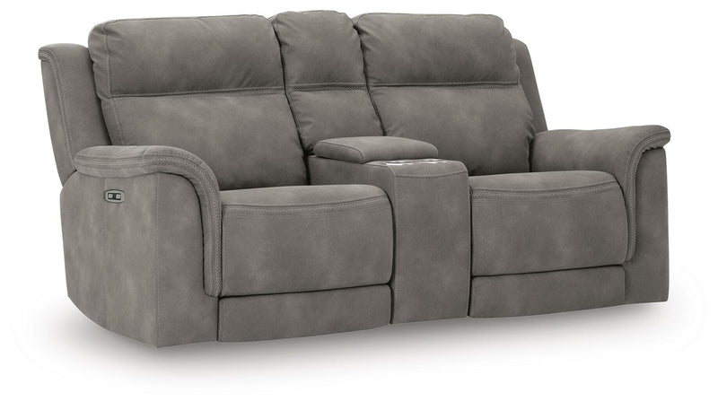 Ashley Furniture Next-Gen DuraPella power reclining loveseat with console, shown from an angled view with closed recliners.