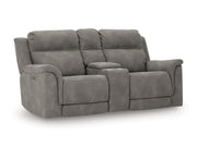 Ashley Furniture Next-Gen DuraPella living room set with plush sofa and matching armchair, shown from an angled view.