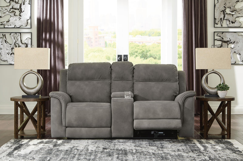 Ashley Furniture Next-Gen DuraPella Power Reclining Loveseat with console, featuring plush cushions and built-in cup holders.