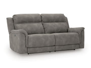 Ashley Furniture Next-Gen DuraPella living room set with plush sofa and matching armchair, shown from an angled view.