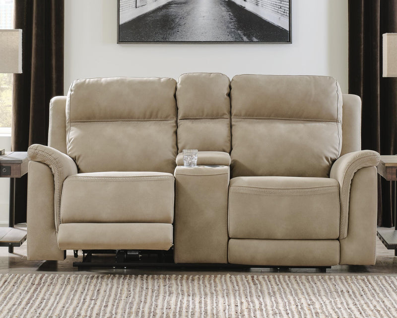 Ashley Furniture Next-Gen DuraPella power reclining loveseat with built-in console and plush cushions, in a modern fabric finish.