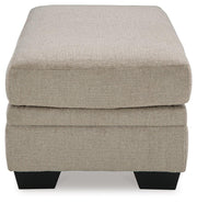 Ashley Furniture Stonemeade living room set with sofa and armchair, featuring neutral upholstery and stylish design.
