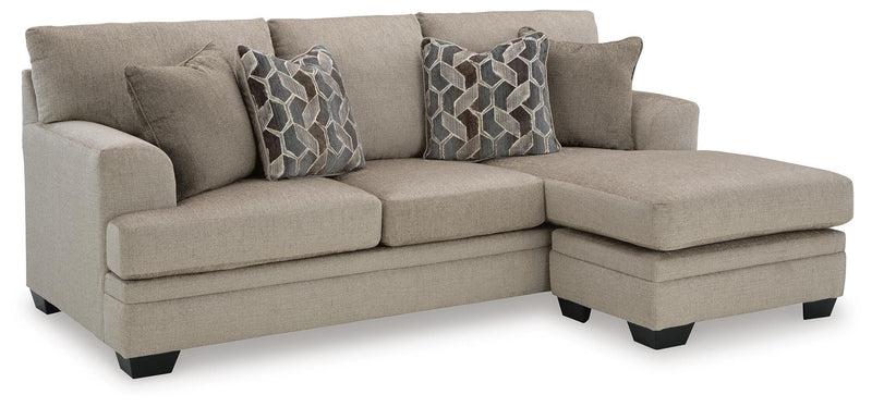Ashley Furniture Stonemeade living room set with sofa, loveseat, and armchair arranged in a modern living room scene.