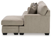 Ashley Furniture Stonemeade sofa chaise, side view showing plush fabric upholstery and stylish chaise lounge design.