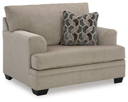 Ashley Furniture Stonemeade living room set with sofa and loveseat, featuring neutral upholstery and modern design.