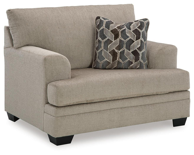 Ashley Furniture Stonemeade living room set with sofa and loveseat, featuring neutral upholstery and modern design.