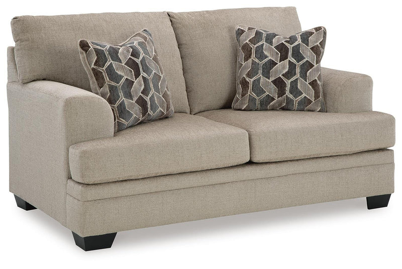 Ashley Furniture Stonemeade living room set with sofa and loveseat, featuring neutral fabric upholstery and modern design.