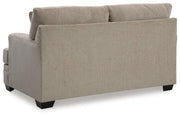 Ashley Furniture Stonemeade living room set with sofa and armchair, showcasing plush cushions and elegant upholstery.
