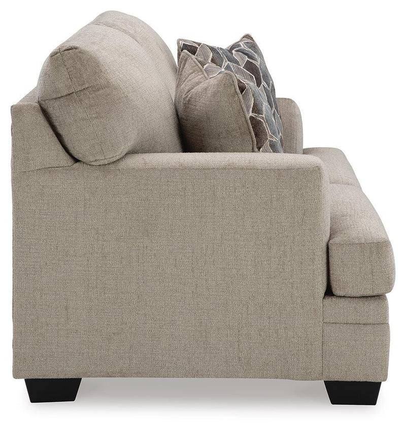 Ashley Furniture Stonemeade living room set with sofa and armchair, featuring neutral fabric and classic design.