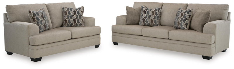 Ashley Furniture Stonemeade living room set featuring a sofa and armchair with neutral fabric upholstery and classic design.