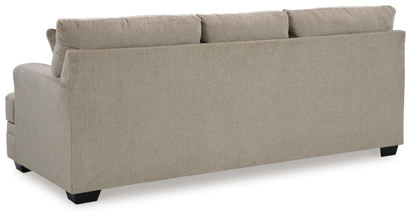 Ashley Furniture Stonemeade living room set with sofa and armchair, featuring plush cushions and neutral fabric upholstery.
