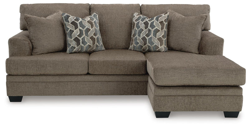 Ashley Furniture Stonemeade living room set with plush fabric sofa and loveseat, stylish cushions, and wooden legs.